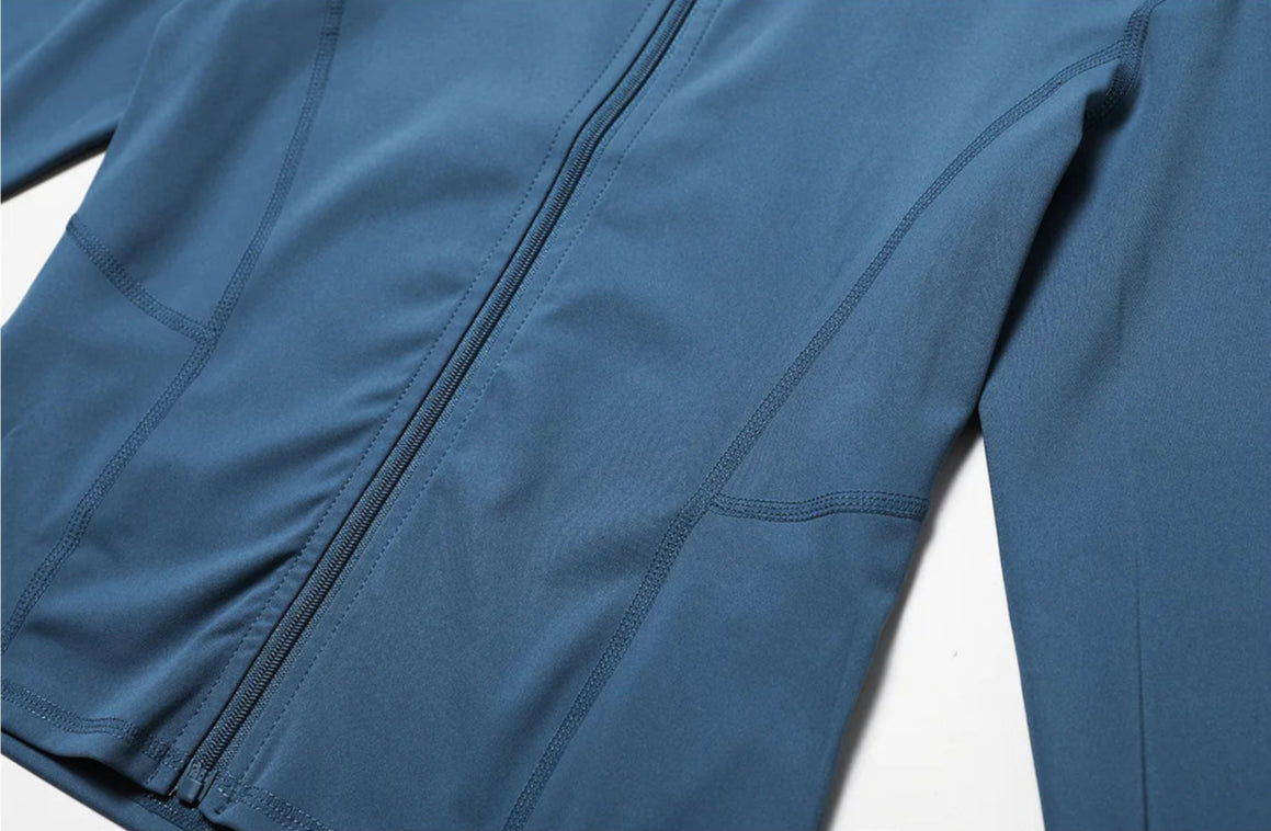 Close-up of nylon-spandex blend yoga jacket with long sleeves