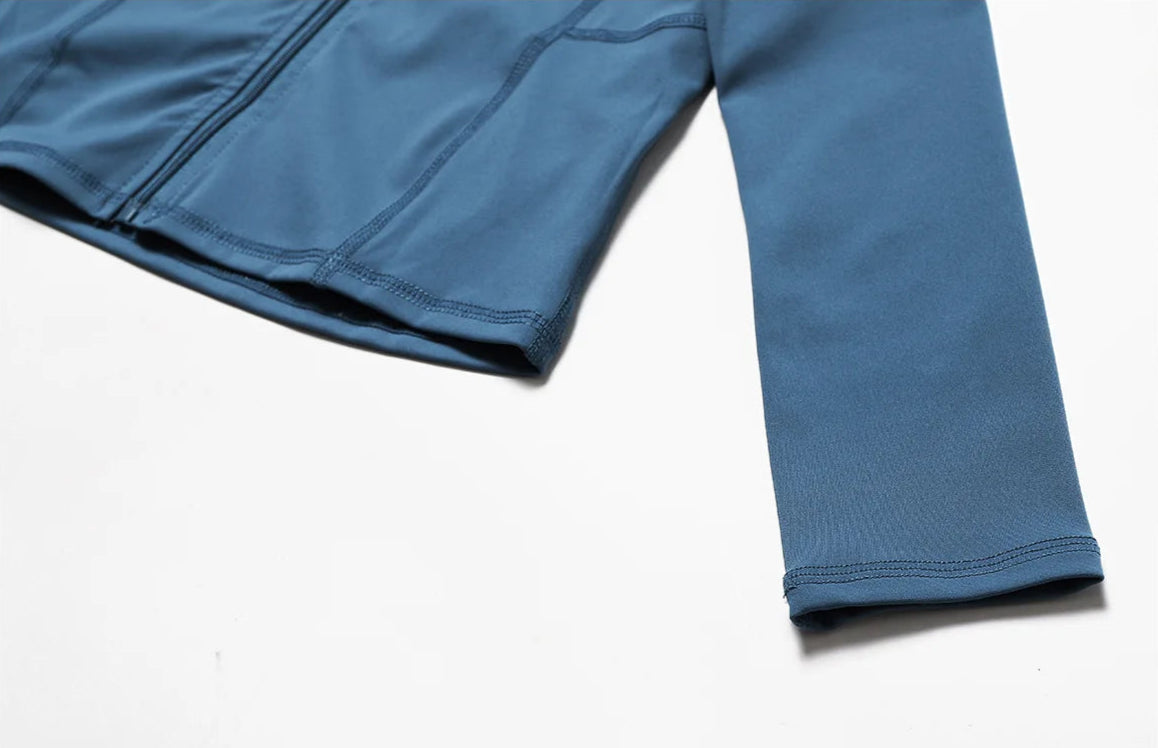 Close-up of nylon-spandex blend yoga jacket with long sleeves