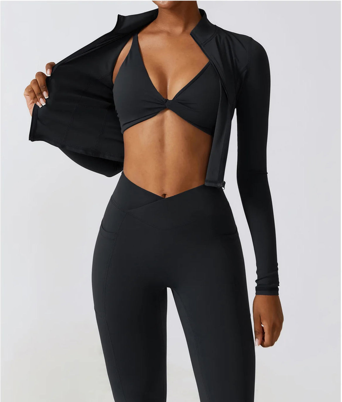 Ergonomic full-length zip running top for women in black