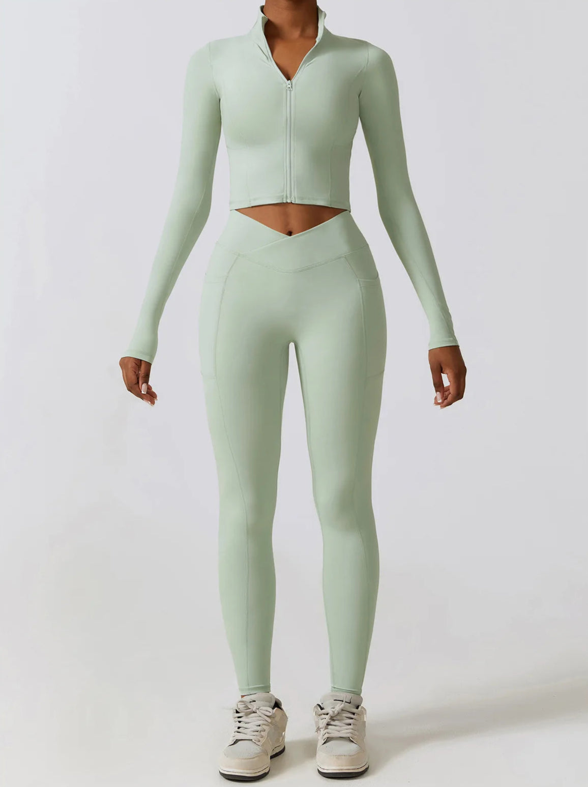 Ergonomic full-length zip running top for women in light green