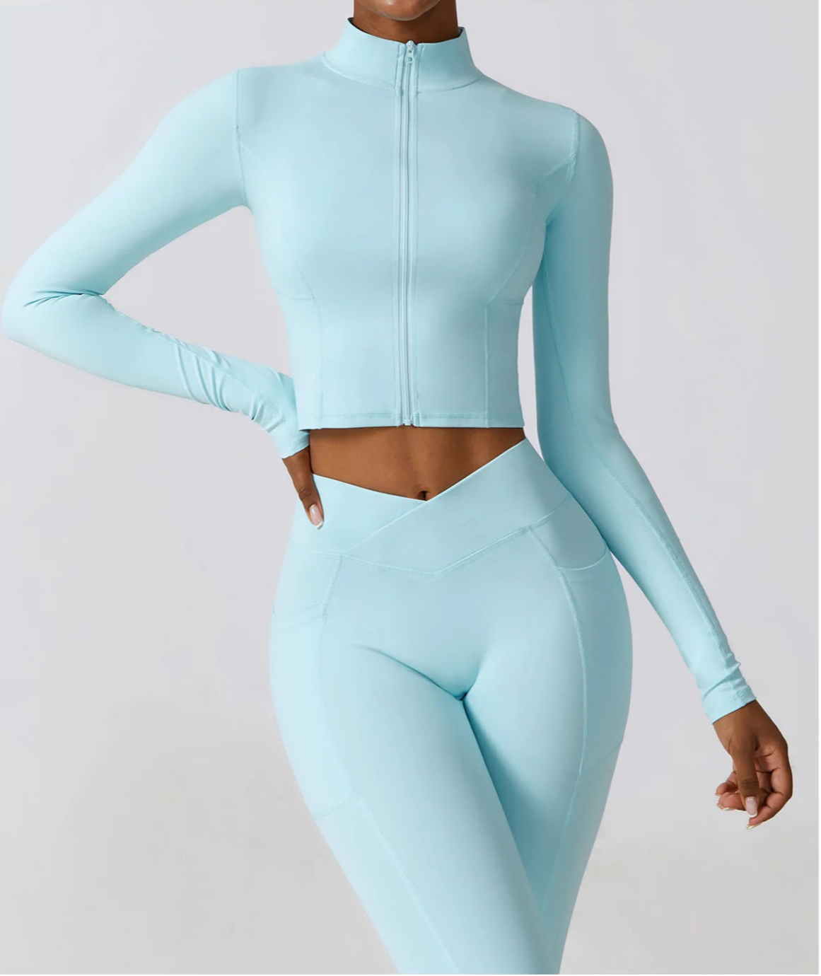 Ergonomic full-length zip running top for women in light blue