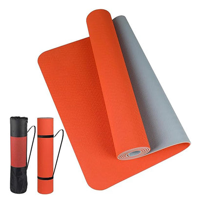 Anti-skid yoga mat rolled out with a sleek black design on a wooden floor.