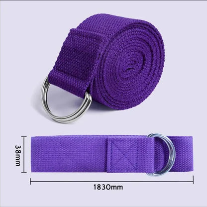 Durable purple yoga strap rolled on a white surface, perfect for stretching and flexibility exercises