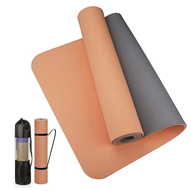 Anti-skid yoga mat rolled out with a sleek black design on a wooden floor.