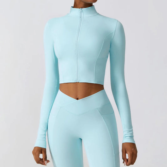 Ergonomic full-length zip running top for women in light blue
