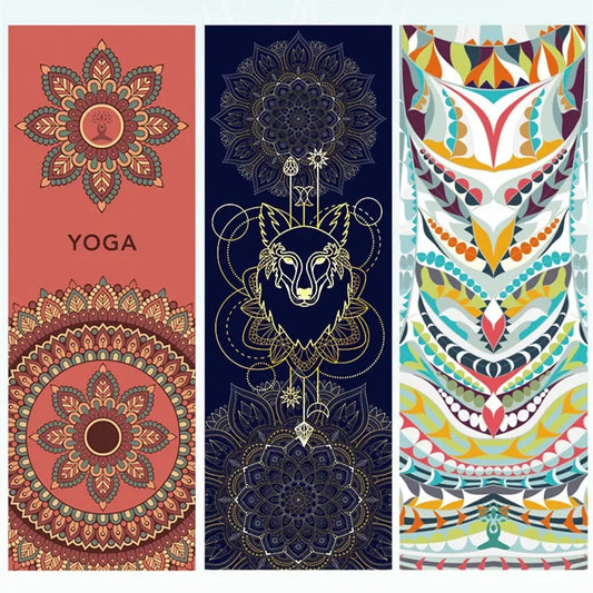 Artistic yoga towel with vibrant printed design on a yoga mat.